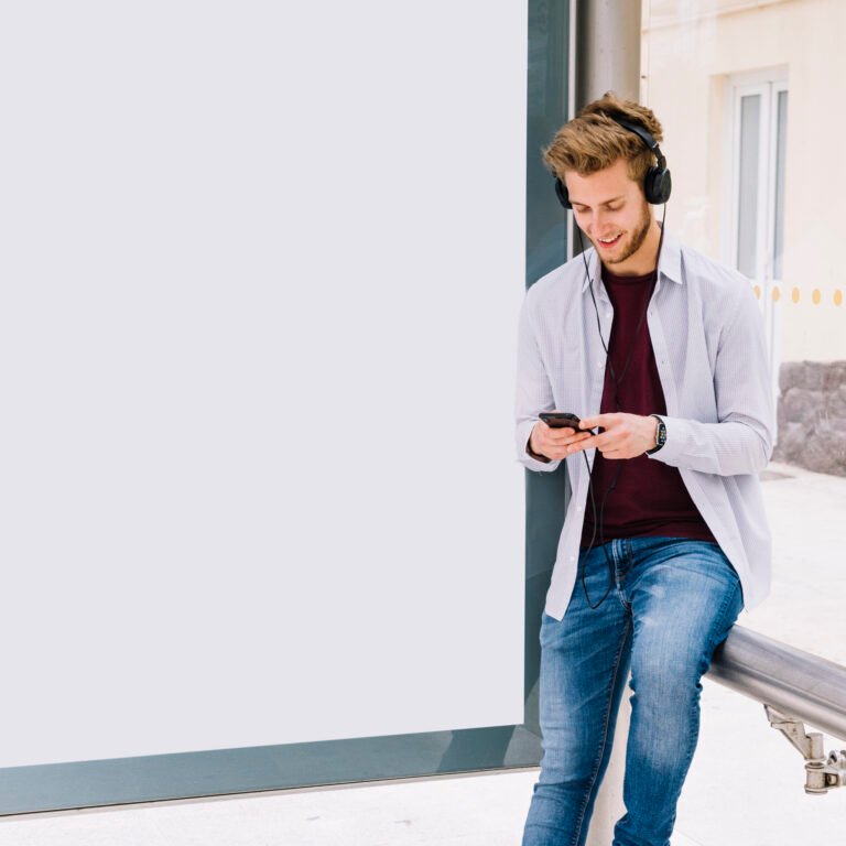 happy-man-listening-music-with-earphone